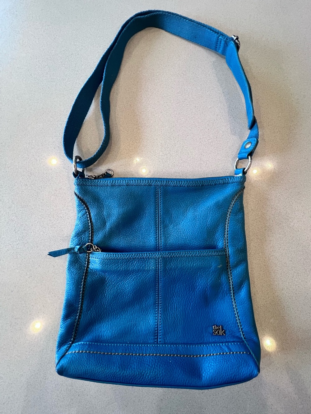 The Sak Teal Blue Pebbled Leather Crossbody Bag